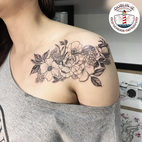 tattoo of flowers on shoulder